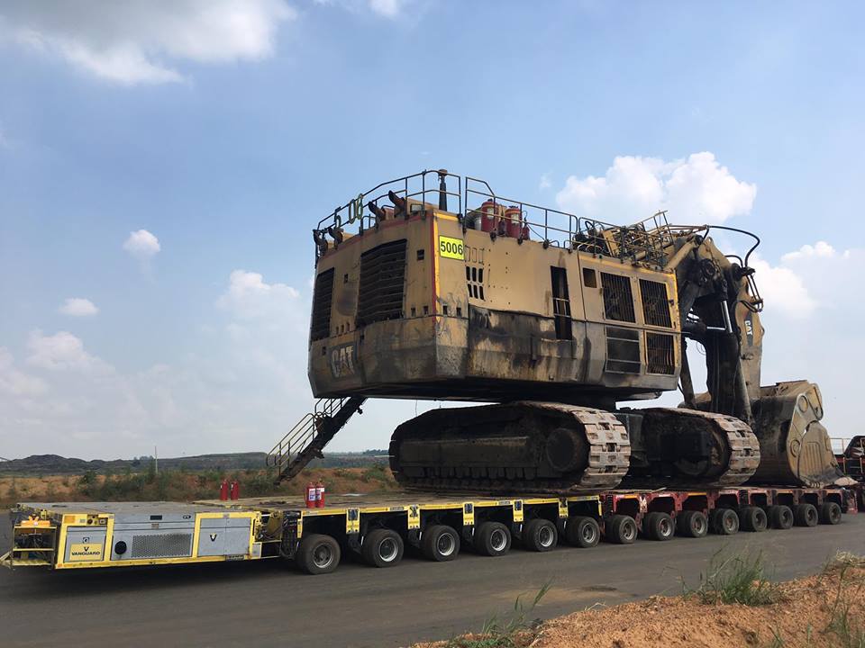 Goldhofer PST self propelled modular trailer SPMT haul giant Caterpillar Excavator, www.heavyliftphoto.com